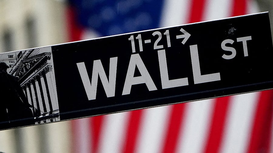 A Wall Street sign is pictured outside the New York Stock Exchange, in New York City. Credit: Reuters Photo