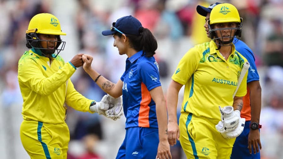 Winners Australian (W) interact with Indian (W) players after the Group-A Preliminary Round women's T20 cricket match between India and Australia, at the Commonwealth Games 2022 (CWG), in Birmingham, UK, Friday, July 29, 2022. Credit: PTI Photo