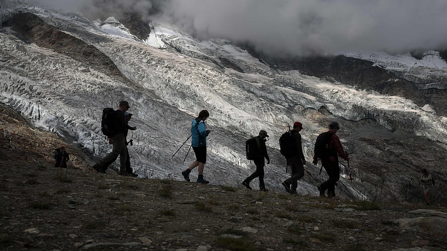 But with warmer temperatures speeding up glacier melt and thawing permafrost, which scientists say are driven by climate change, routes that are usually safe this time of year now face hazards like falling rocks released from the ice. Credit: AFP Photo 