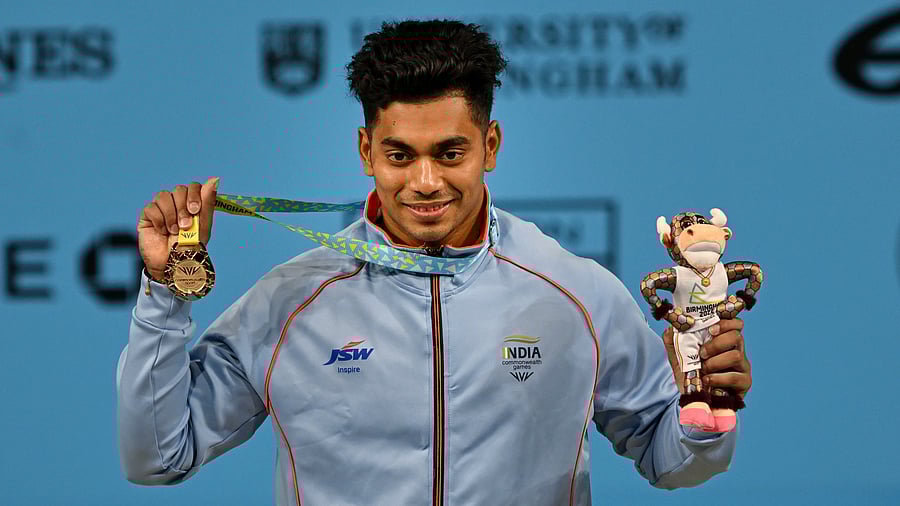 Debutant Sheuli heaved 313kg (143kg+170kg) and grabbed the gold. Credit: PTI Photo 