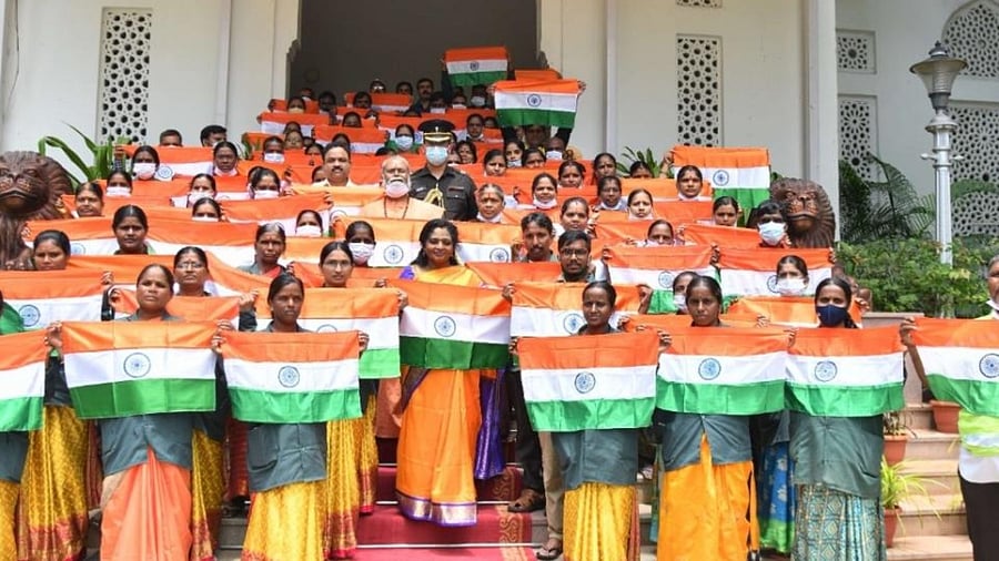 Telangana Governor Dr. Tamilisai Soundararajan distributed flags and other material to the sanitation staff of the Raj Bhavan during 'Har Ghar Tiranga' campaign, in Hyderabad on Tuesday, Aug 02, 2022. Credit: IANS Photo