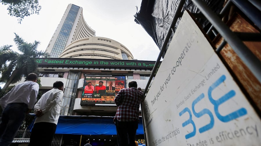 People stand outside the Bombay Stock Exchange (BSE). Credit: Reuters Photo