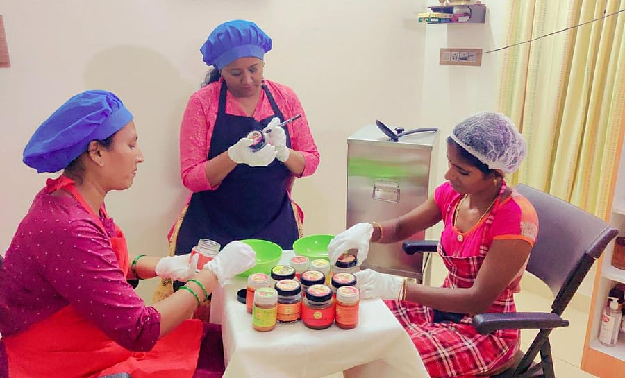 Chitra Swamy (middle) and her team at their manufacturing unit in Banashankari.