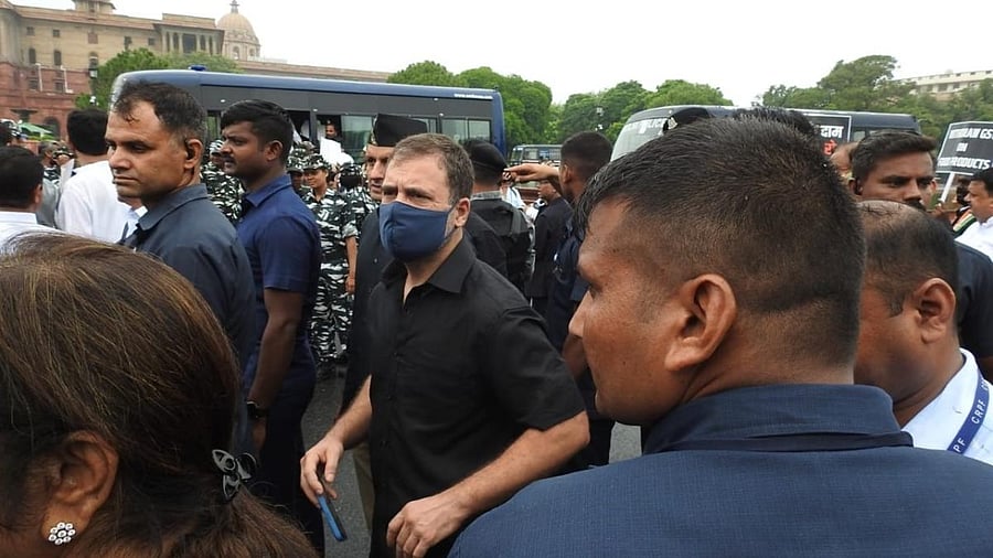 Rahul Gandhi along with all party MPs protest outside parliament. Credit: IANS Photo
