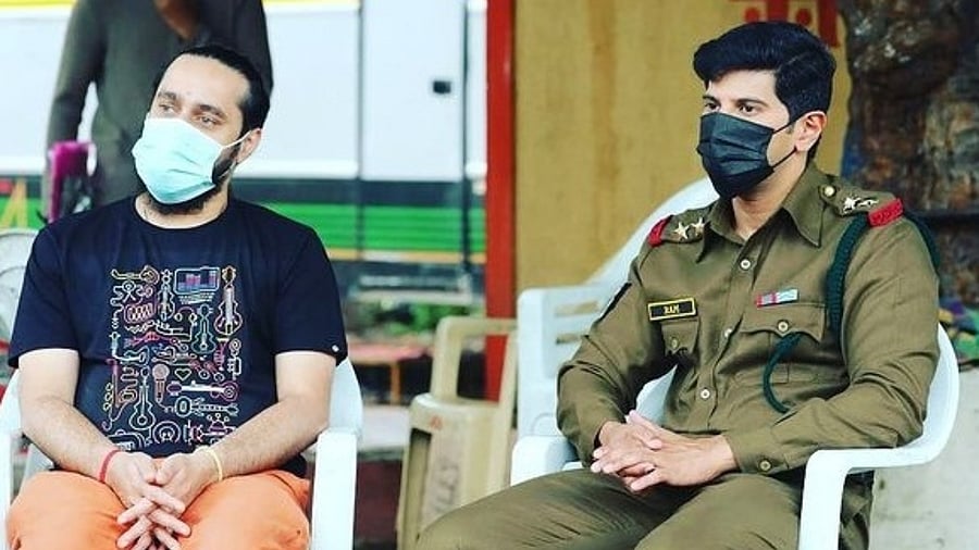 Dulquer Salmaan with Vishal Chandrashekar. Credit: IANS Photo