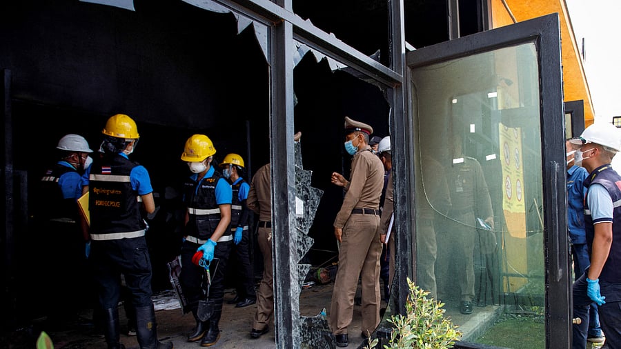 Forensic and police officers investigate the Mountain B nightclub on August 5, 2022. Credit: Reuters Photo 