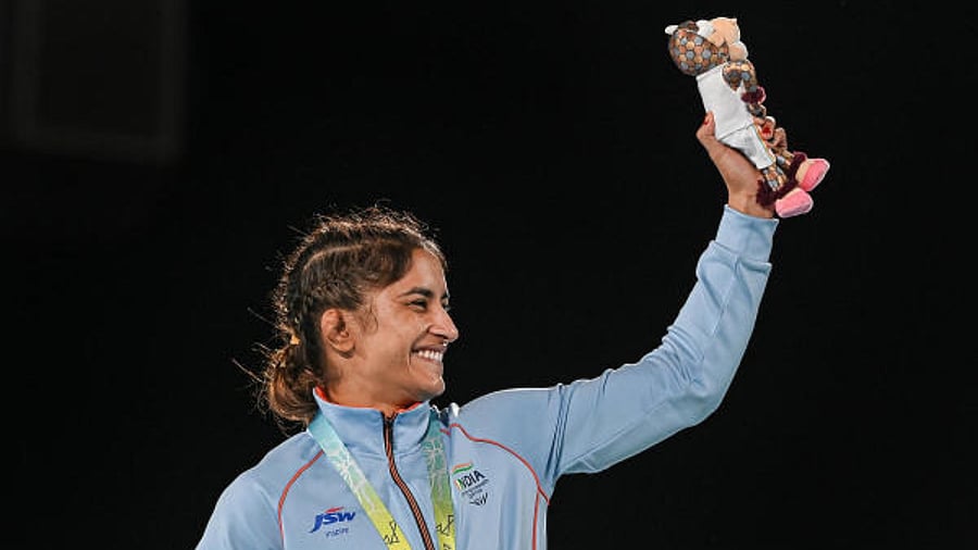 Gold medallist Vinesh Phogat during the Women's Freestyle Wrestling 53kg Nordic event medal ceremony at the Commonwealth Games (CWG), in Birmingham, UK, Saturday, Aug. 6, 2022. Credit: PTI Photo