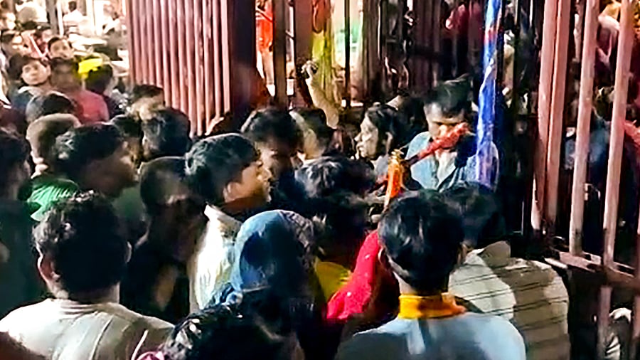 An incident of stampede at the Khatu Shyam Ji temple, in Sikar district of Rajasthan, Sunday night, Aug 8, 2022. Three women were killed and several others injured in the stampede that took place during the Ekadashi fair. Credit: PTI Photo