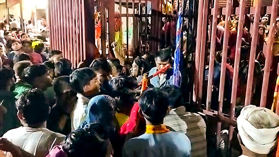 As soon as the temple opened at around 4:30 am, the devotees flocked for 'darshan'. Credit: PTI Photo