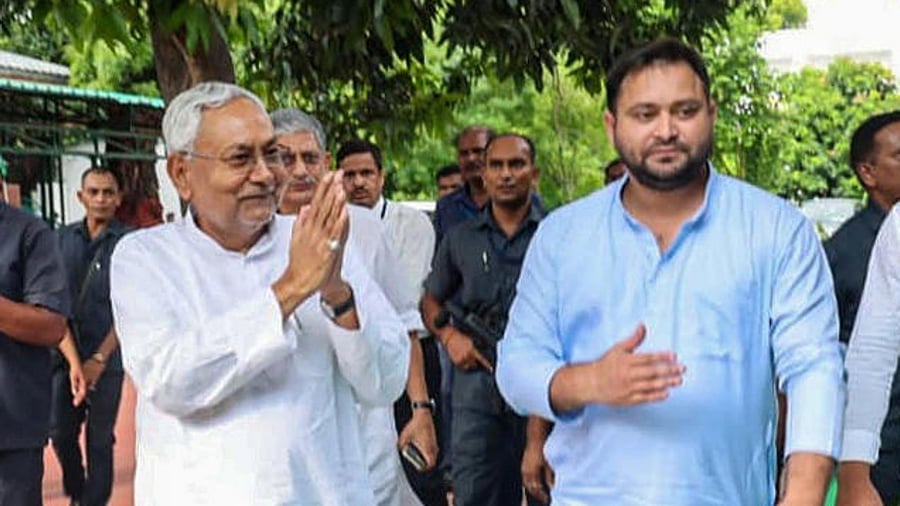 Janata Dal (United) leader Nitish Kumar with Rashtriya Janata Dal leaders Tejashwi Yadav and Tej Pratap, in Patna, Tuesday, Aug. 9, 2022. Credit: PTI Photo