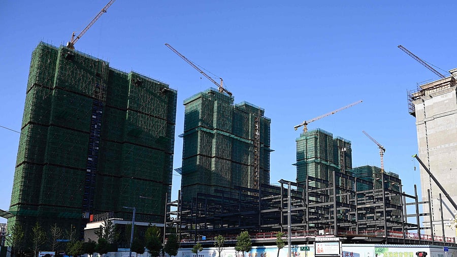 A construction site of an Evergrande housing complex in Zhumadian, central China’s Henan province. - After years of explosive growth Chinese authorities launched a crackdown on excessive debt in 2020, squeezing financing options for property sector giants such as Evergrande as they struggled to make repayments and restructure mountains of debt. Credit: AFP File Photo