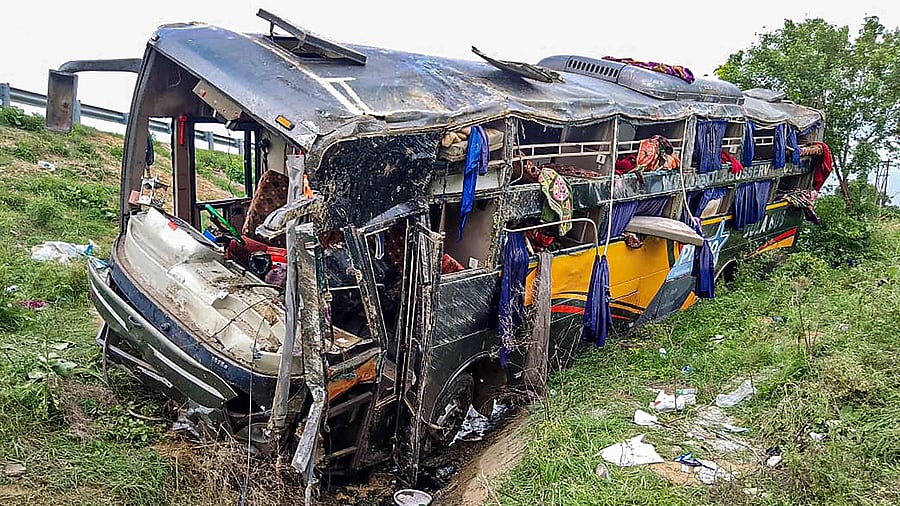 A damaged bus after it fell into a gorge following its collision with a divider on Agra-Lucknow Expressway, in Firozabad. Credit: PTI Photo
