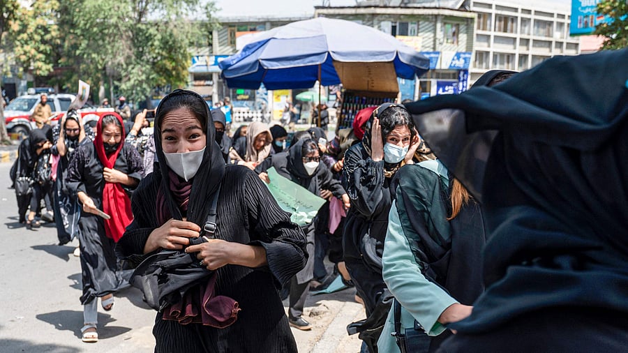 Taliban fighters fire in air to disperse Afghan women protesters in Kabul. Credit: AFP Photo