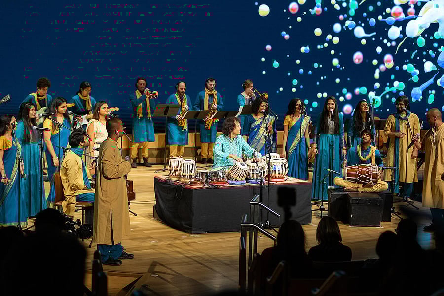 Tabla maestro Zakir Hussain in a concert with the Berklee Indian Ensemble this year. Credit: DH Photo