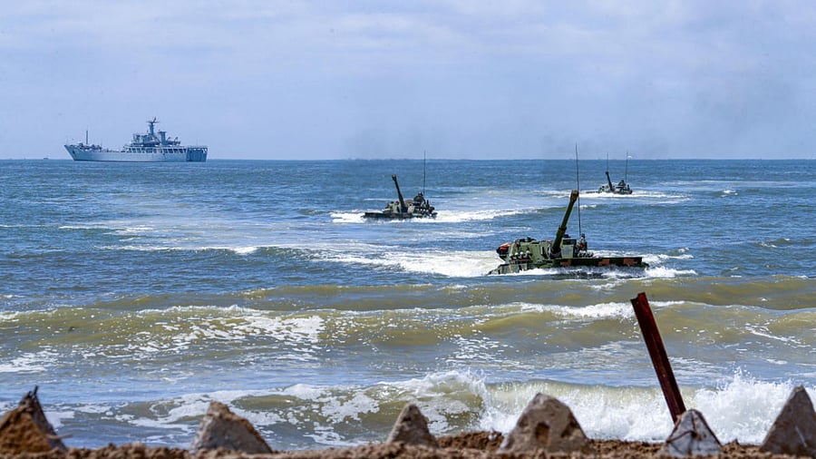 Amphibious armoured vehicles under Chinese People's Liberation Army (PLA) Eastern Theatre Command take part in an assault wave formation training exercise. Credit: Reuters Photo