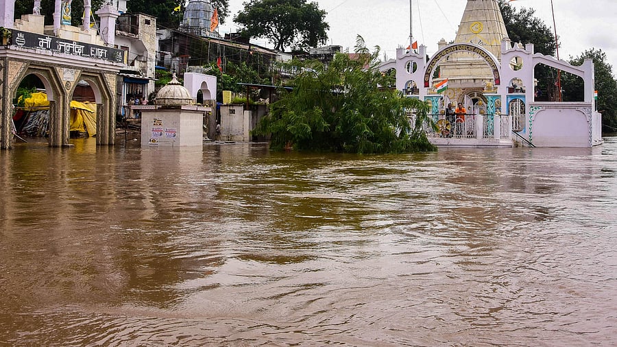 A temple is partially submerged in floodwater. Representative image. Credit: PTI Photo