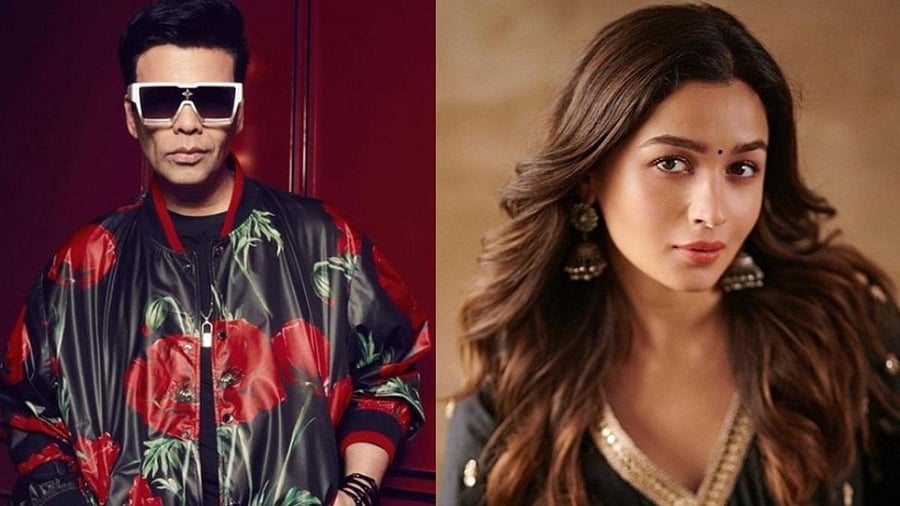 Karan Johar, Alia Bhatt. Credit: IANS Photo