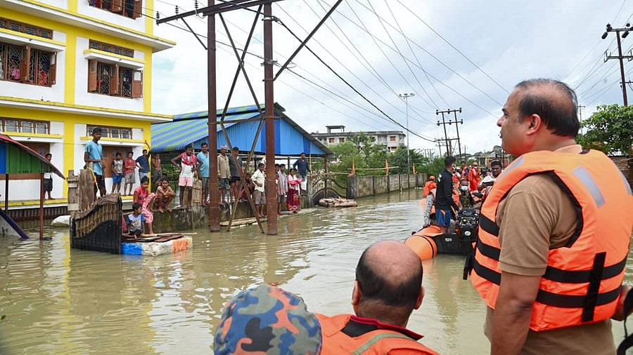 The state government on Saturday started disbursing financial assistance to the families for the reconstruction of their houses. Credit: PTI Photo