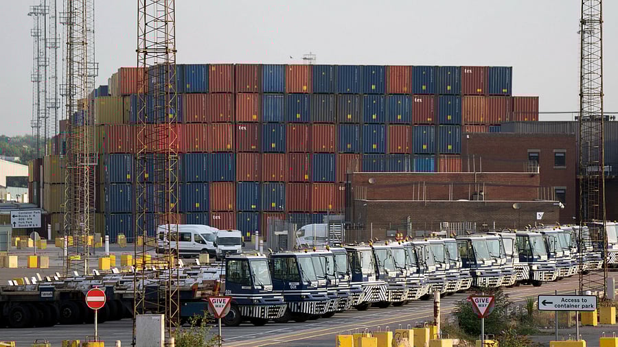 Vehicles sit idle at the Port of Felixstowe in Suffolk, Sunday August 21, 2022. Credit: AP Photo