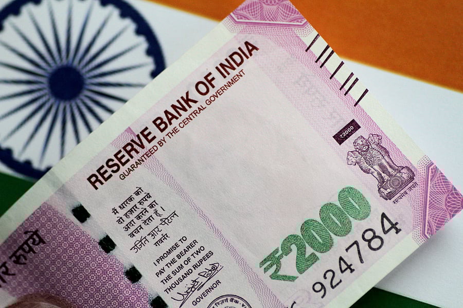 The rupee was trading at 79.86 per US dollar by 0542 GMT, down from 79.7750 in the previous session, edging closer to its Jul.19 record low of 80.0650. Credit: Reuters Photo