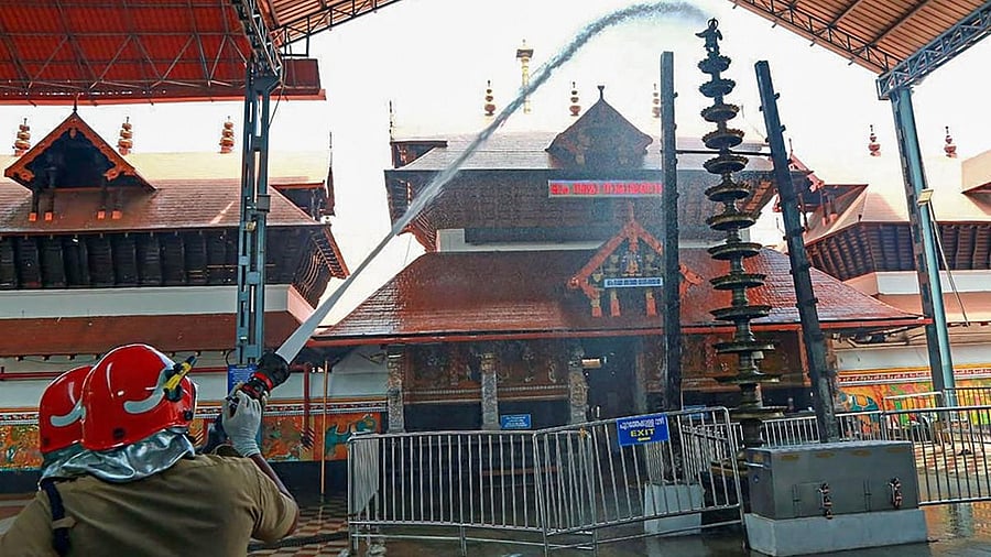 Guruvayur Sri Krishna temple being cleaned. Credit: DH File Photo