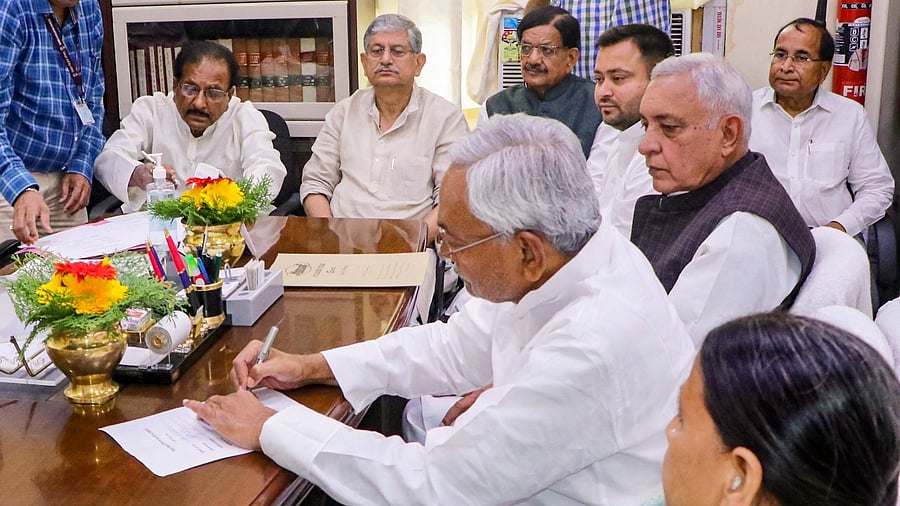 Bihar Chief Minister Nitish Kumar with RJD leader Rabri Devi during nomination filing of Janata Dal (United) candidate Devesh Chandra Thakur for Council Chairman of Bihar Vidhan Parisad. Credit: PTI Photo