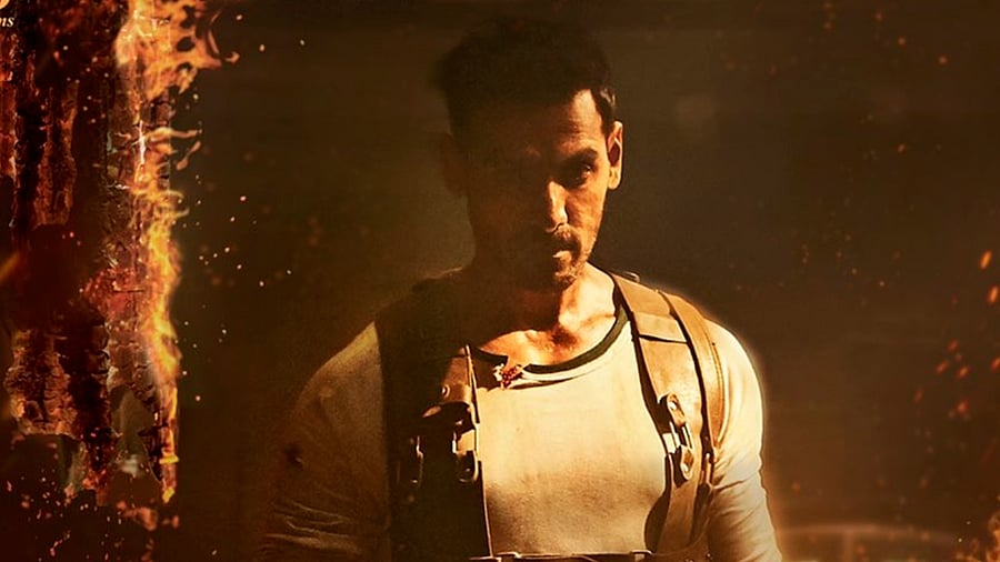 John Abraham in the 'Pathaan' poster. Credit: Twitter/@TheJohnAbraham