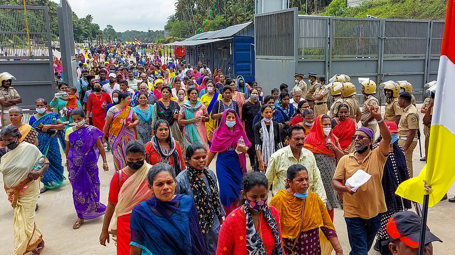 People belonging to fishing community and other activists during their protest against Adani Groups' port development project, at Vizhinjam in Thiruvananthapuram. Credit: PTI Photo