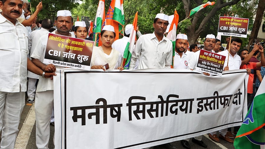 Delhi Pradesh Congress Committee members stage a protest and demand the resignation of Manish Sisodia on Saturday August 20, 2022. Credit: IANS Photo
