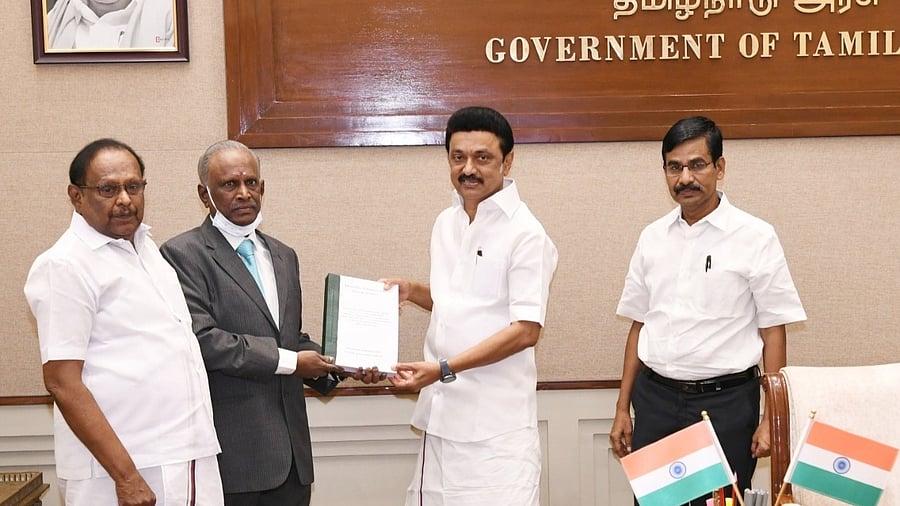 Chief Minister M K Stalin with the report submitted by the Commission. Credit: Special Arrangement