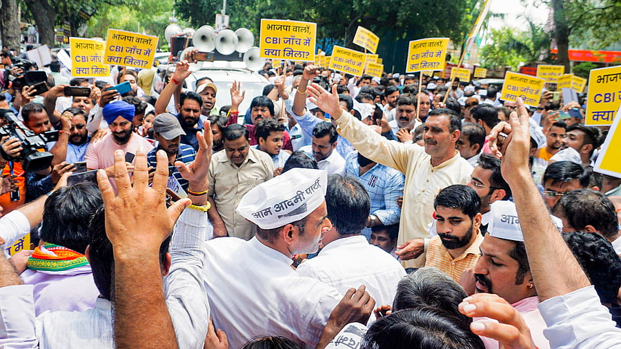 Aam Aadmi Party (AAP) workers stage a protest over Central Bureau of Investigation (CBI)'s recent raid at Delhi Deputy CM Manish Sisodia residence. Credit: PTI Photo