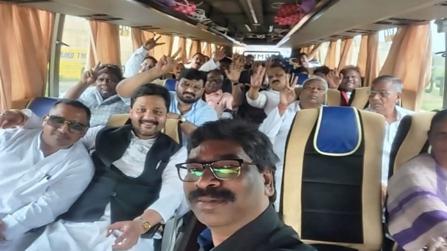 J'khand CM Hemant Soren along with all 50 UPA MLA's inside a bus as they depart for Khunti after being disqualified by Jharkhand Governor Ramesh Bais in connection with holding Office of Profit belonging to illegal Mining Scam in Ranchi on Saturday, August 27, 2022. Credit: IANS Photo