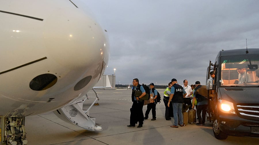 This photo shows IAEA team members boarding a plane at Vienna International Airport on their way to Ukraine, August 29, 2022. Credit: AFP Photo / Dean Calma / IAEA