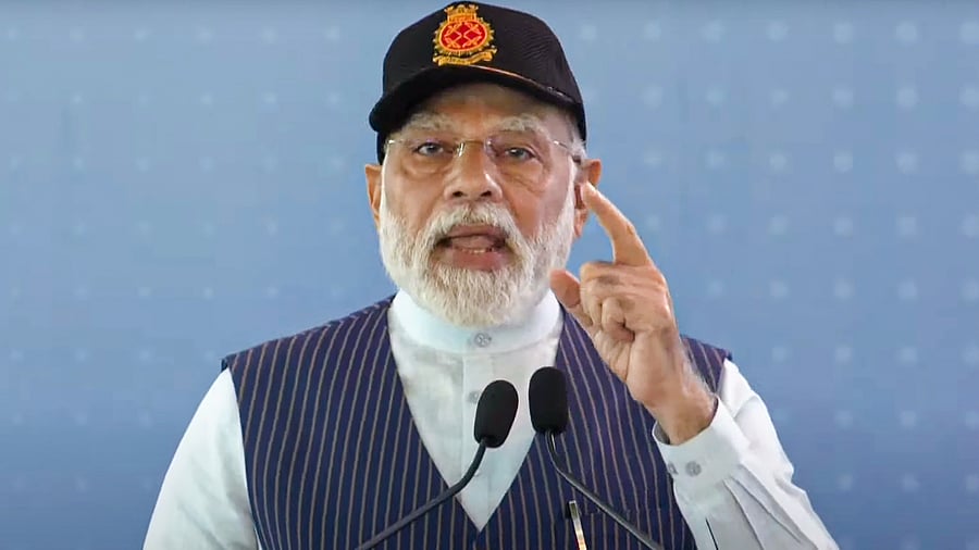 Prime Minister Narendra Modi addresses the commissioning ceremony of the first indigenously designed and built aircraft carrier, INS Vikrant. credit: PTI Photo