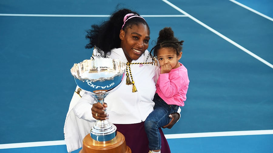 Serena Williams holds her daughter Alexis Olympia Ohanian Jr after winning the ASB trophy in New Zealand, January 12, 2022. Credit: AP/PTI File Photo