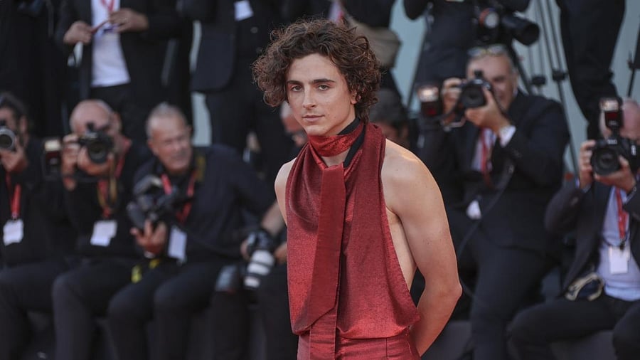 Timothee Chalamet poses for photographers upon arrival at the premiere of the film 'Bones and All' during the 79th edition of the Venice Film Festival in Venice, Italy, Friday, Sept. 2, 2022. Credit: AP Photo