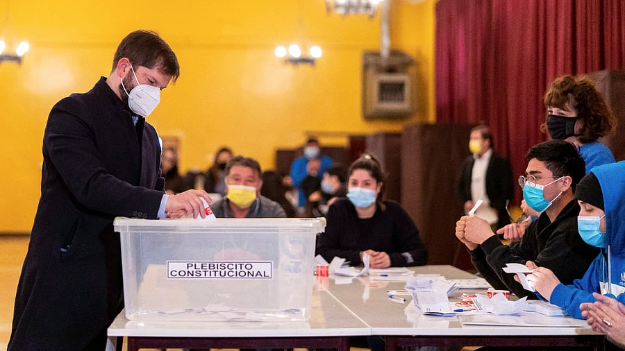 Chile's President Gabriel Boric casts his ballot during a referendum on a new Chilean constitution. Credit: Reuters Photo