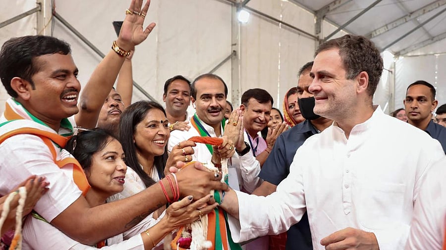 Congress leader Rahul Gandhi being welcomed by party workers on his arrival in Ahmedabad. Credit: PTI Photo