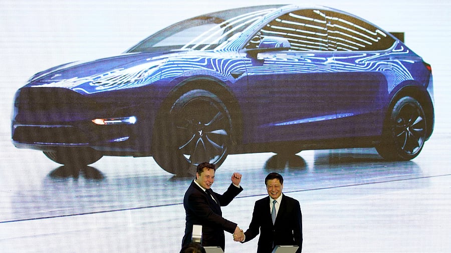 Tesla Inc CEO Elon Musk and Shanghai's Mayor Ying Yong attend an opening ceremony for Tesla's China-made Model Y program in Shanghai, China January 7, 2020. Credit: Reuters File Photo