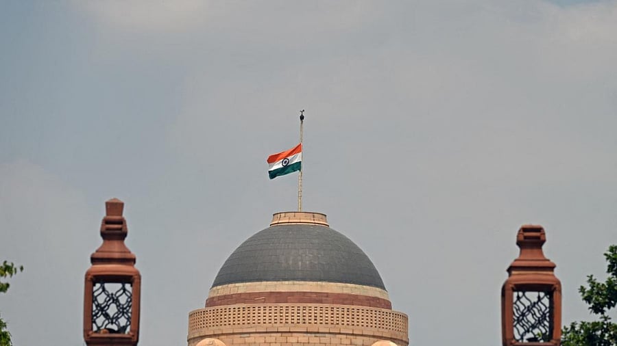 The Indian national flag flies half-mast at the country's presidential palace to mourn the death of Queen Elizabeth II, in New Delhi on September 11. Credit: AFP Photo