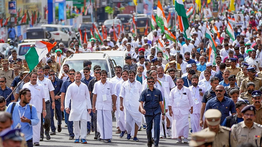 Congress leaders Rahul Gandhi, KC Venugopal, Shashi Tharoor and other party workers during the Bharat Jodo Yatra, in Thiruvananthapuram district. Credit: PTI Photo