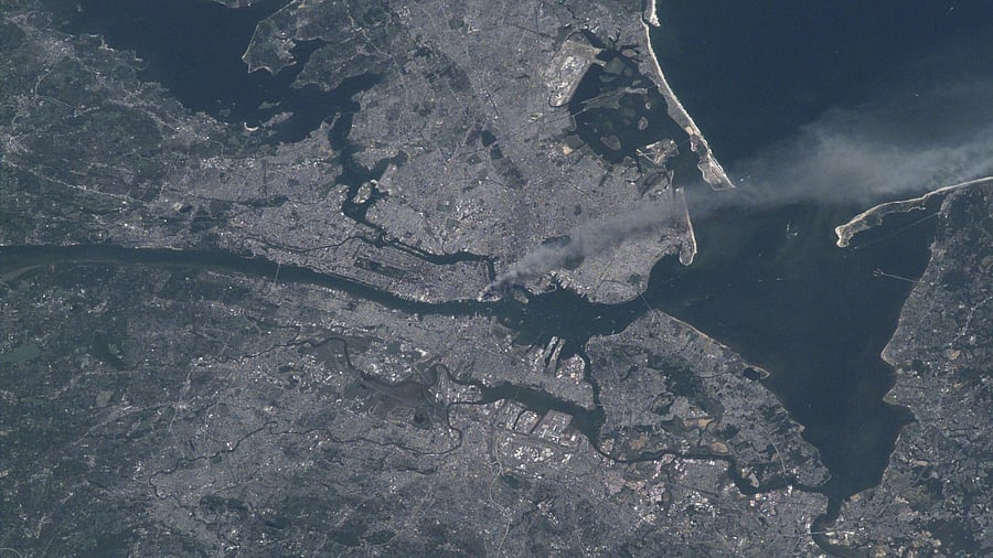 This image shows a plume of smoke rising from the site of 9/11 attack, taken from the ISS. Credit: IANS Photo