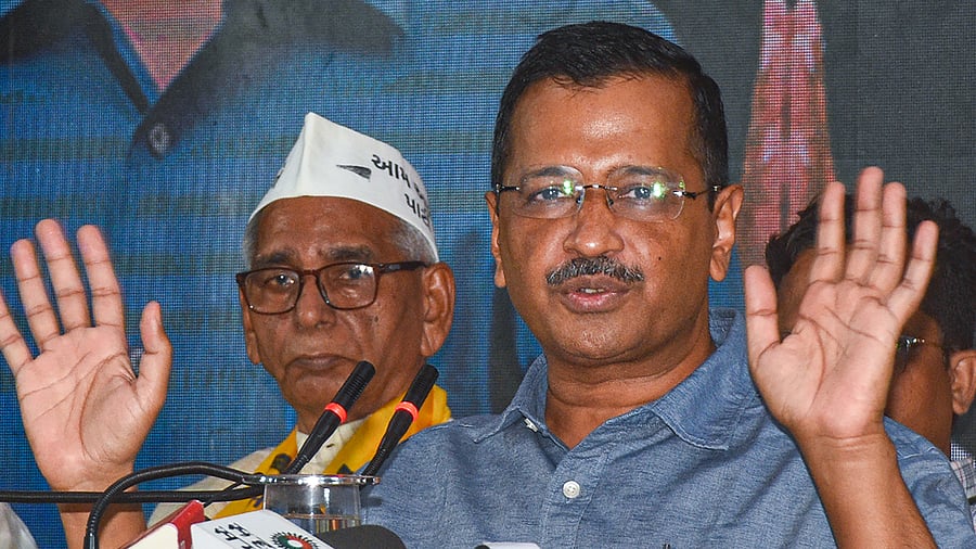 Delhi Chief Minister Kejriwal landed in Ahmedabad on Sunday evening to hold town hall meetings with auto-rickshaw drivers, businessmen, lawyers and sanitation workers on Monday and Tuesday. Credit: PTI Photo