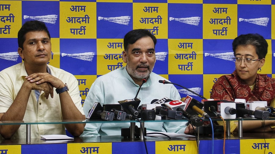 Aam Aadmi party leaders Gopal Rai, Saurabh Bhardwaj and Atishi addressing a press conference at party office ITO in New Delhi. Credit; IANS Photo