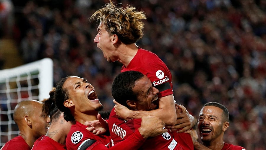 Liverpool's Joel Matip celebrates scoring their second goal with teammates. Credit: Reuters Photo