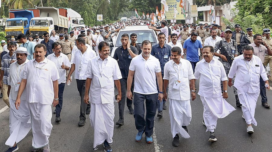 Congress leader Rahul Gandhi with party leaders and workers during the Bharat Jodo Yatra, in Thiruvananthapuram. Credit: PTI Photo