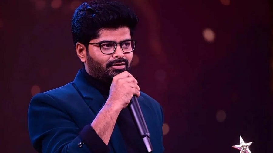 Nagabhushana NS with the SIMMA Best Debut Actor honour for 'Ikkat'. Credit: PTI Photo