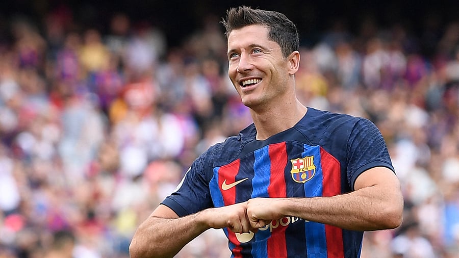 Robert Lewandowski celebrates scoring his team's third goal against Elche, September 17, 2022. Credit: AFP Photo