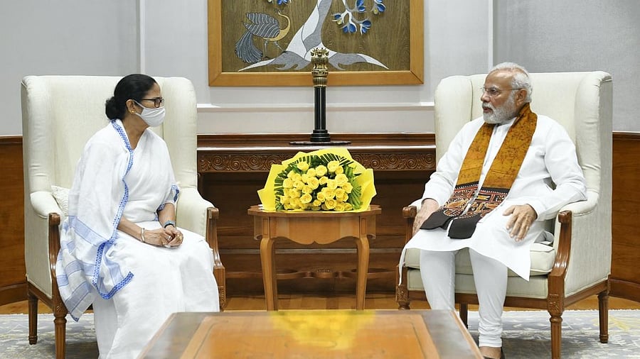Mamata Banerjee (left) and PM Narendra Modi. Credit: PTI file photo