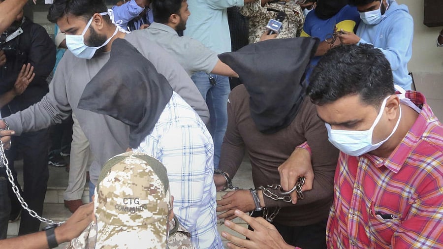 Popular Front of India (PFI) member being produced before court after a nationwide raid spearheaded by the National Investigation Agency (NIA) on Thursday, in Bhopal, Friday, September 23, 2022. Credit: PTI Photo